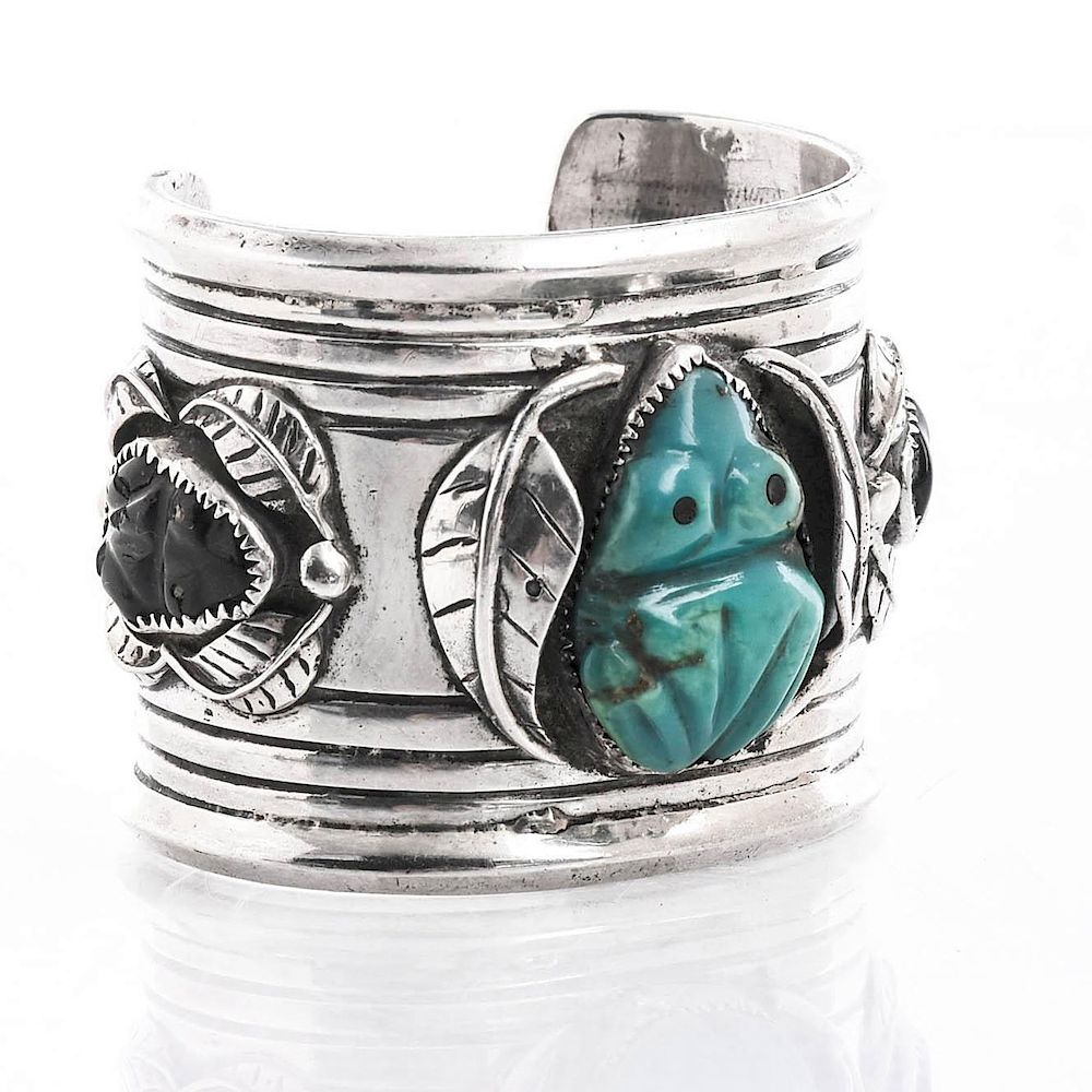 Appraisal: NATIVE AMERICAN SILVER TURQUOISE CARVED FROG BRACELET Total weight approximately