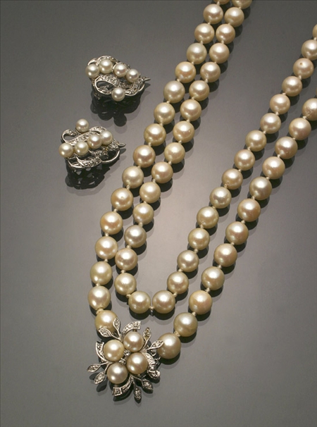 Appraisal: Opera Length Cultured Pearl and Diamond Three-Piece Ensemble Consisting of