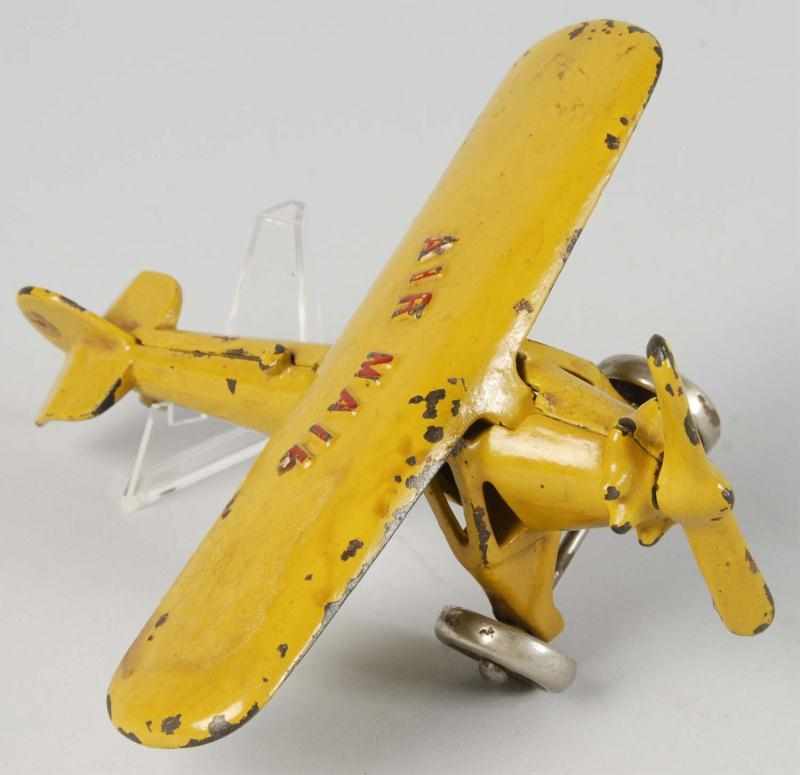 Appraisal: Cast Iron Kenton Airmail Airplane Toy Description American Embossed Airmail