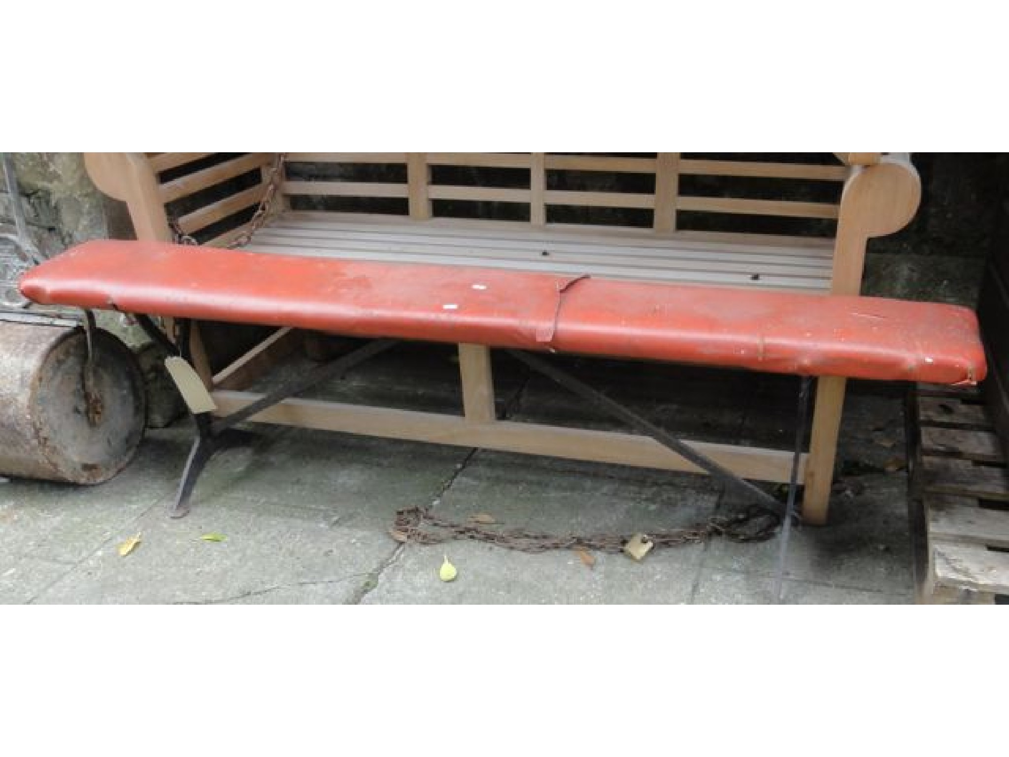 Appraisal: A vintage cast iron bench with wooden plank seat later