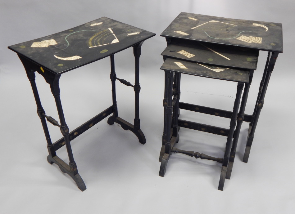 Appraisal: A nest of three Victorian papier mache tables each painted