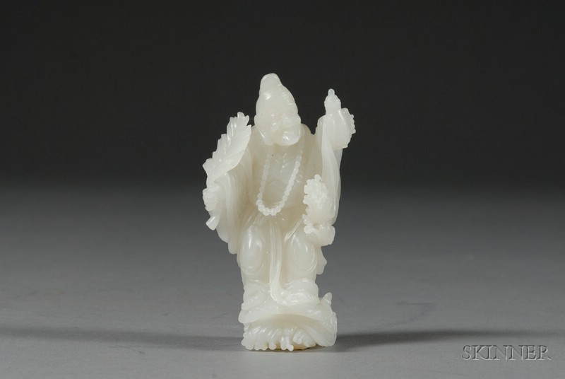 Appraisal: Jade Carving China th century pure white stone depicting a