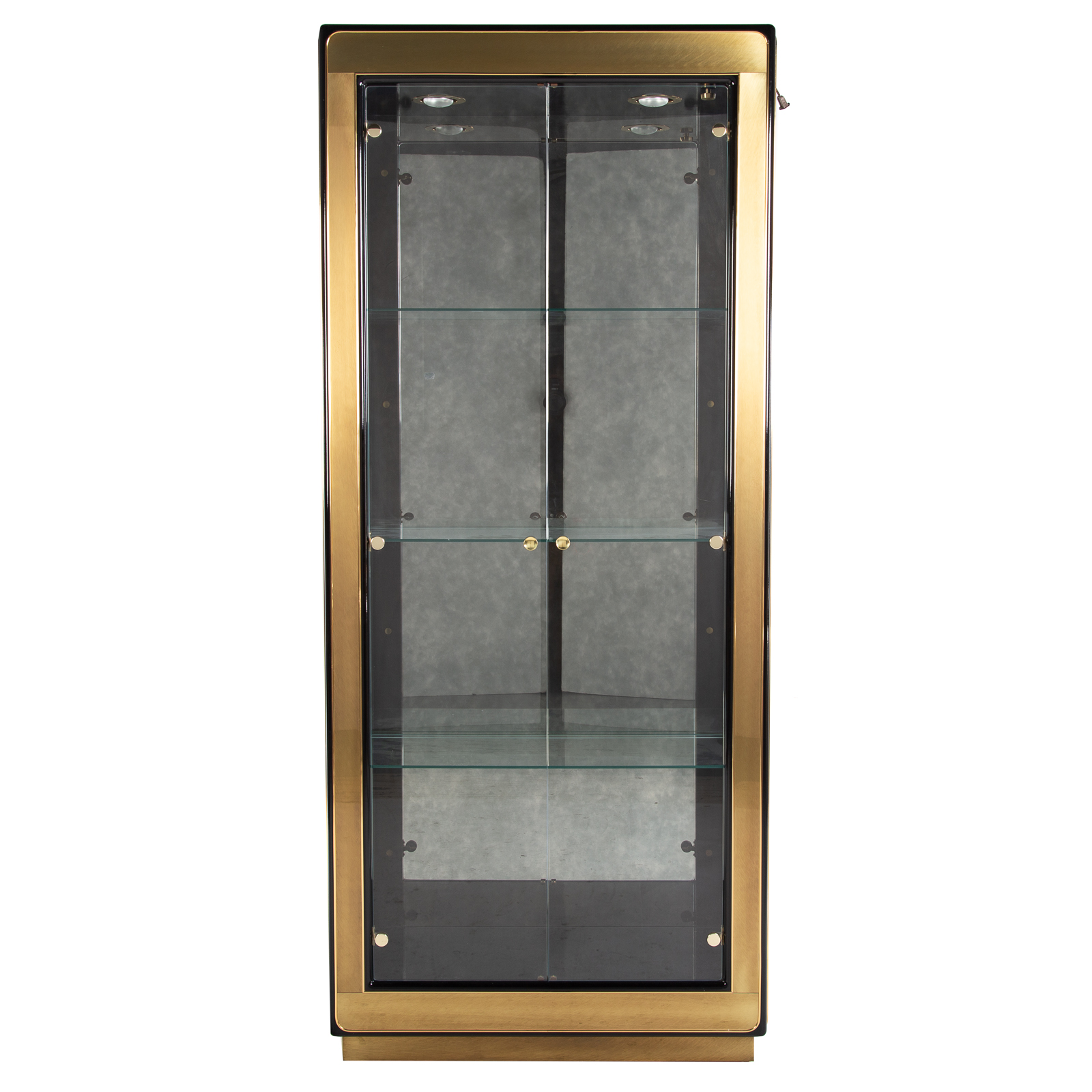 Appraisal: MASTERCRAFT MODERN BRASS EBONIZED CURIO CABINET With interior lighting and