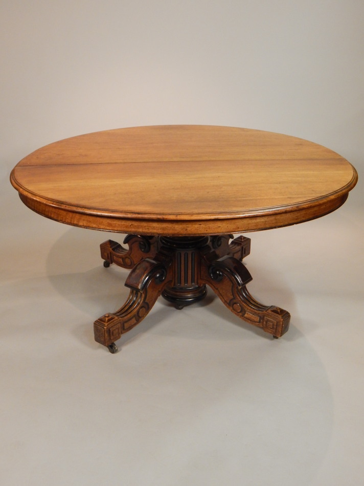 Appraisal: A Victorian walnut dining table the oval top with moulded