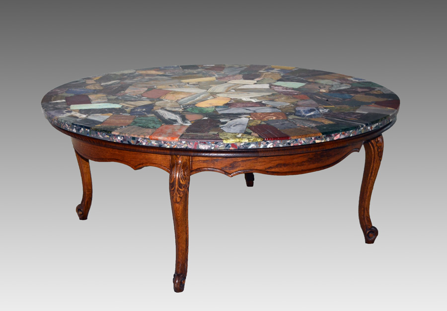 Appraisal: STONE CLAD TOP ROUND COFFEE TABLE Top clad with a