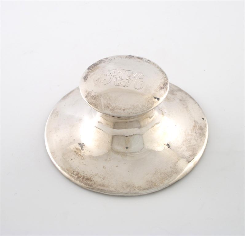 Appraisal: A silver capstan inkwell