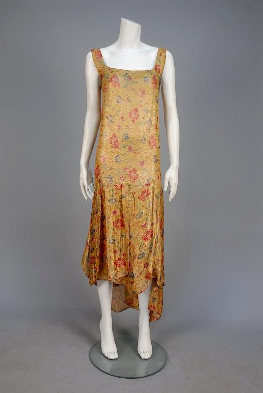 Appraisal: PRINTED LAME EVENING DRESS s Sleeveless gold floral brocade printed