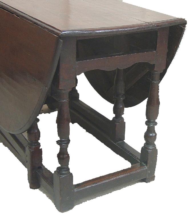 Appraisal: th century oval oak gateleg dining table the shaped frieze