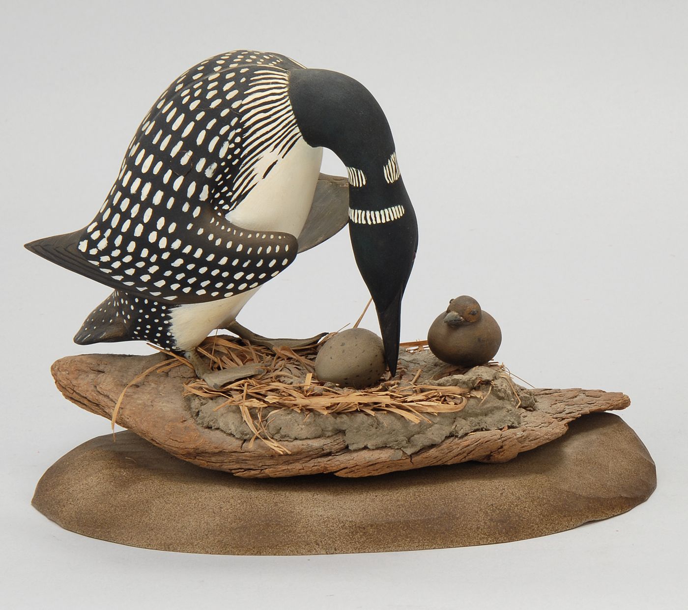 Appraisal: CARVED LOON FAMILY By Wendell Gilley of Southwest Harbor Maine