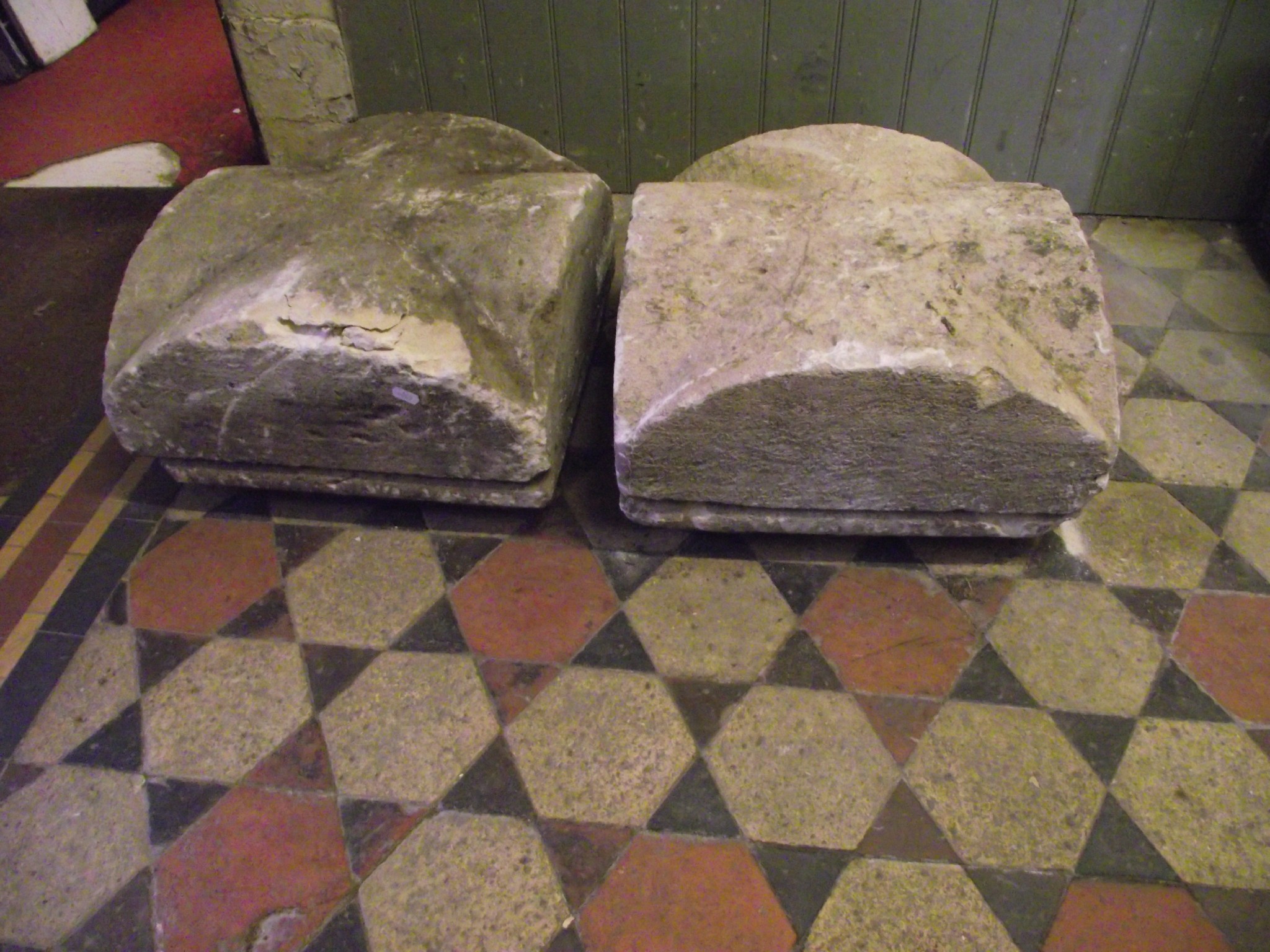 Appraisal: A pair of weathered natural stone pier caps of square