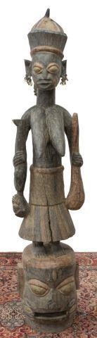 Appraisal: African tribal carved wood maternity figure Yoruba People Nigeria female