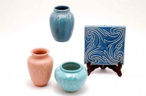 Appraisal: Four different pieces vases and a trivet produced by the