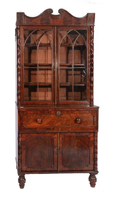 Appraisal: A GEORGE IV MAHOGANY SECRETAIRE BOOKCASE the upper half with