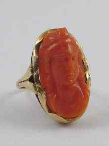 Appraisal: A coral cameo ring set in yellow metal tests ct