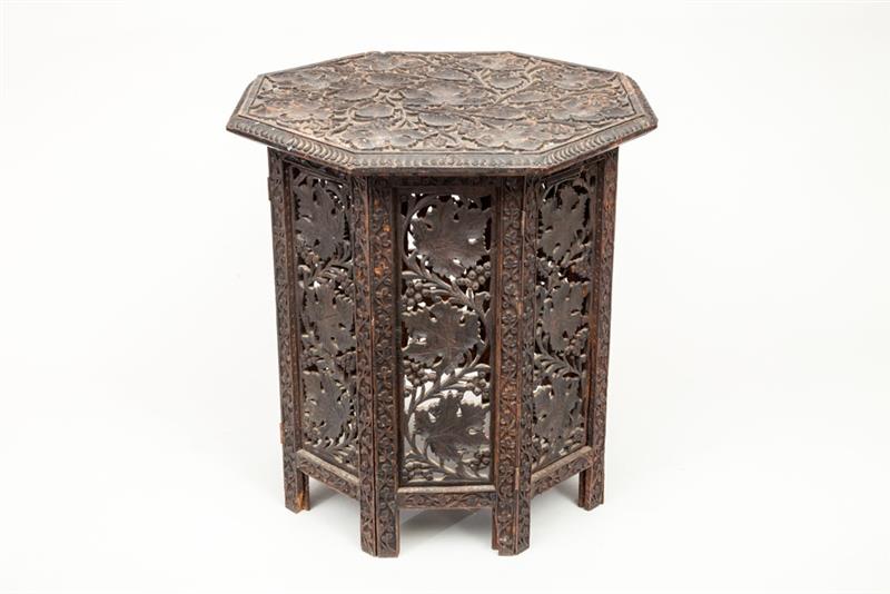 Appraisal: Indian Carved Hardwood Octagonal-Top Table On folding stand x in