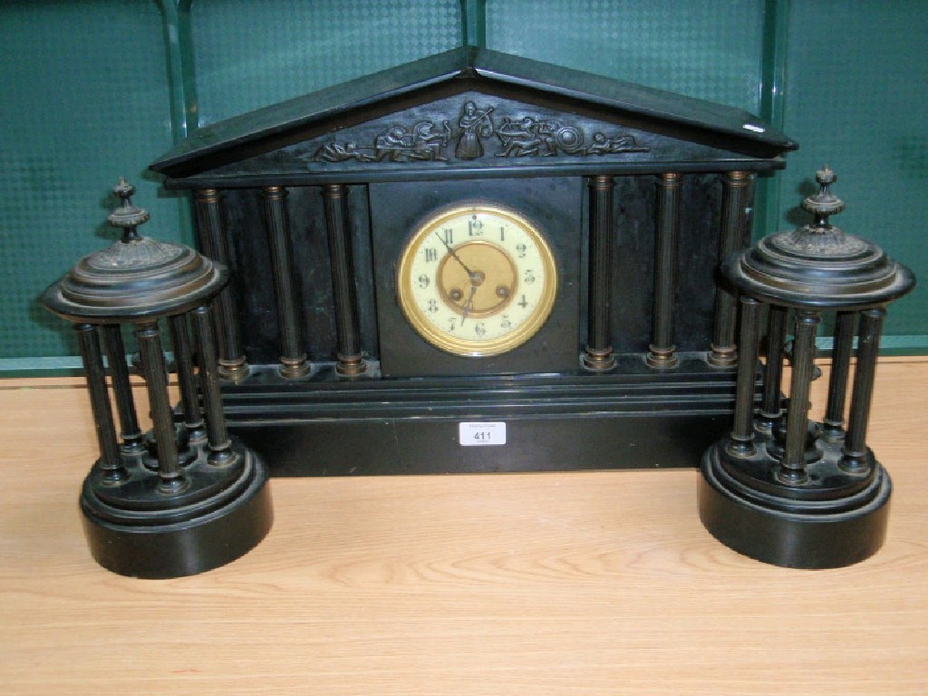 Appraisal: A thC black slate clock clock garniture the French eight