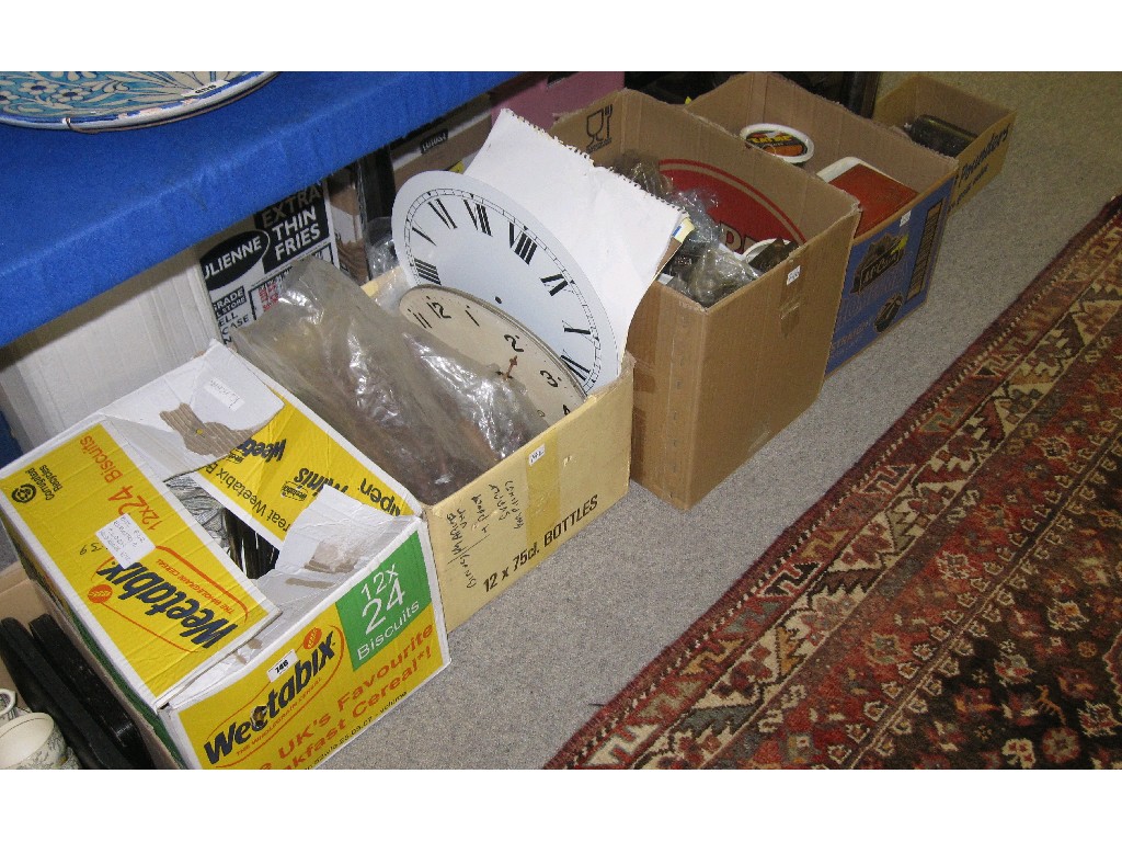 Appraisal: Lot comprising four boxes of clock mechanisms and parts