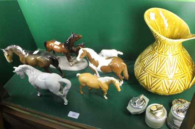 Appraisal: A COLLECTION OF FOUR BESWICK HORSES in various styles including