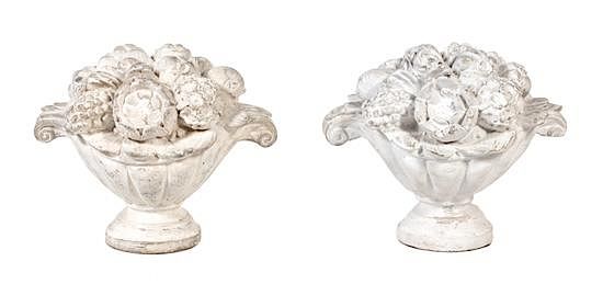 Appraisal: A Pair of Poured Cement Urns with Floral Arrangements Height