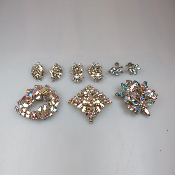 Appraisal: Three Sherman Gold Tone Metal Brooches And Earrings all set