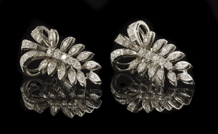 Appraisal: Pair of Eighteen-Karat White Gold and Diamond Articulated Floral Earrings