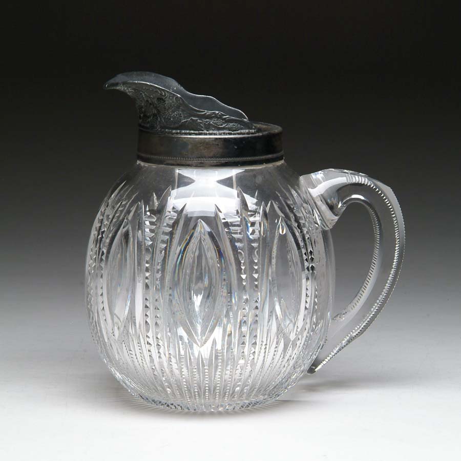 Appraisal: CUT GLASS WATER PITCHER Cut with vertical notched flutes and