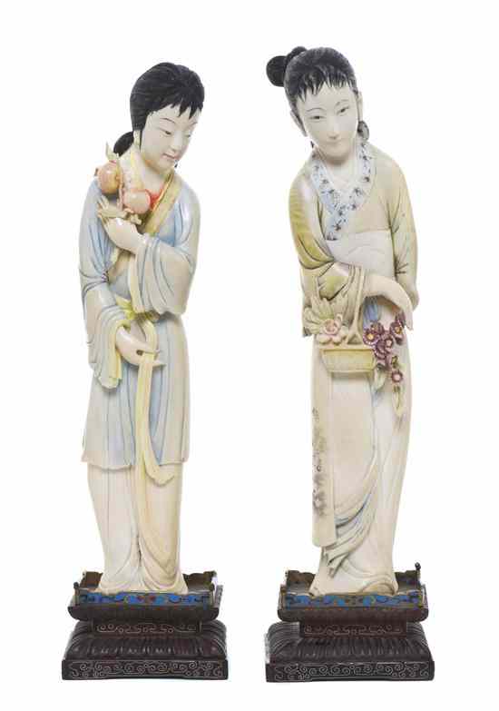 Appraisal: Two Chinese Carved Ivory Polychrome Decorated Figures the first of