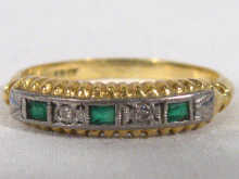 Appraisal: An carat gold diamond and emerald half eternity ring