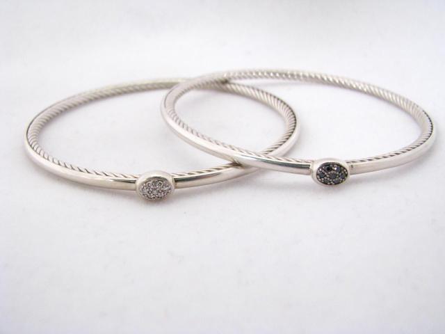 Appraisal: Two David Yurman sterling silver bangle bracelets with diamond center