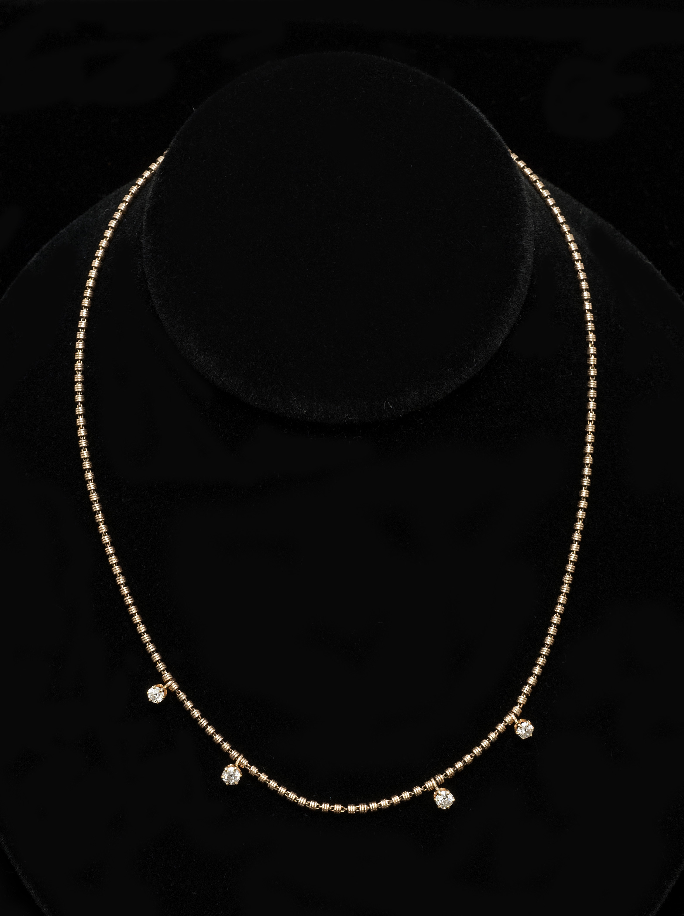 Appraisal: KT YELLOW GOLD AND DIAMOND NECKLACE With four approximately carat