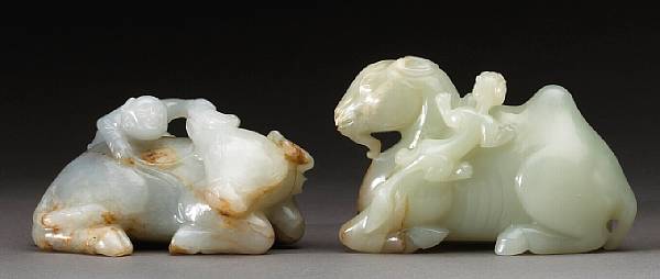 Appraisal: Two jade carvings of animals The first carved as a