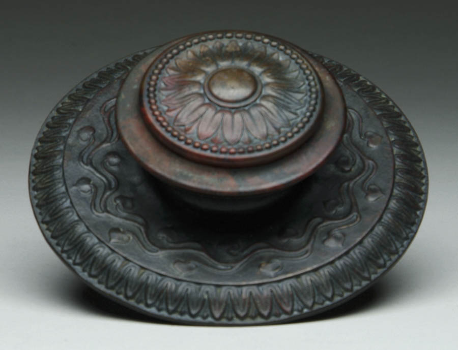 Appraisal: TIFFANY STUDIOS INKWELL Circular decorative inkwell rests upon an Art