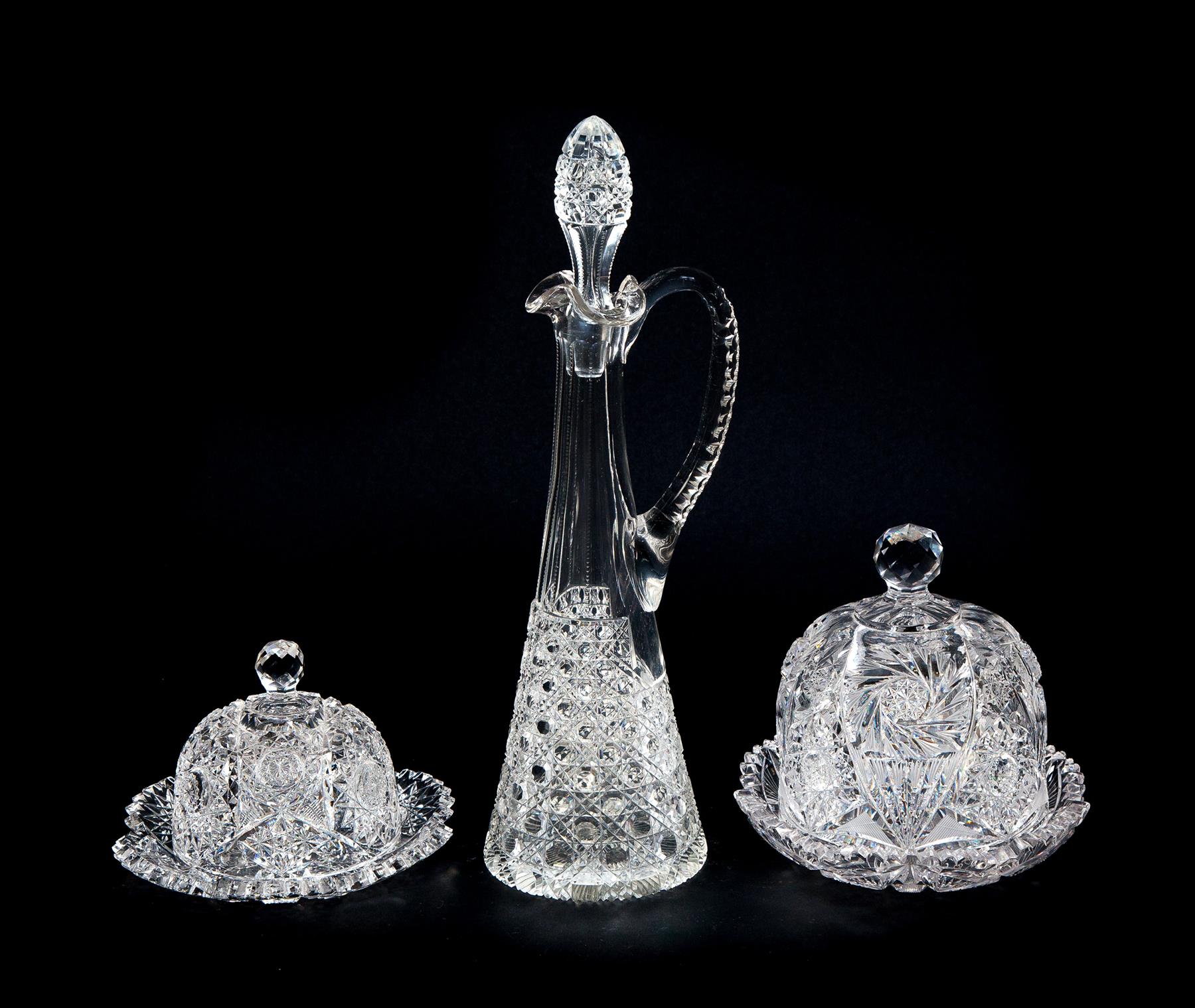 Appraisal: FIVE PIECES OF CUT GLASS American th century Tall handled