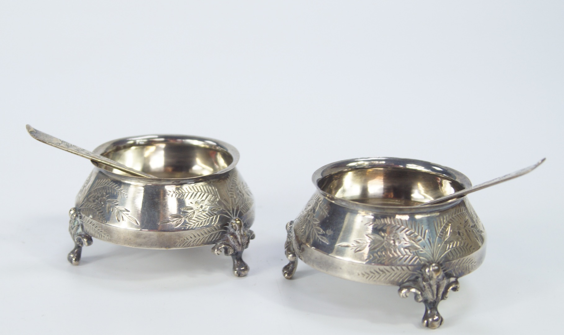 Appraisal: A pair of Victorian silver circular salts of squat conical