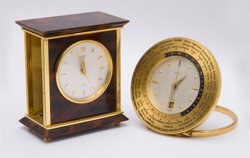 Appraisal: TWO SWISS TRAVEL CLOCKS RETAILED BY HERMES PARIS Comprising a