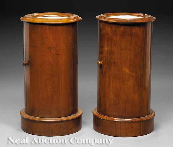 Appraisal: A Pair of Antique Mahogany Cylinder Commodes circular white marble