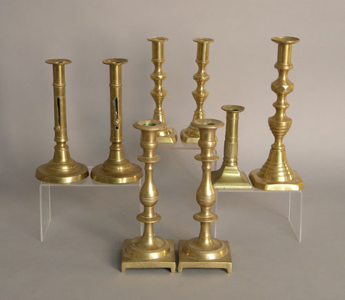 Appraisal: Group of eight brass candlesticks th c tallest