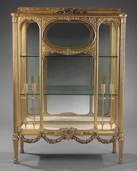 Appraisal: An Antique Louis XVI-Style Carved and Giltwood Vitrine Cabinet late