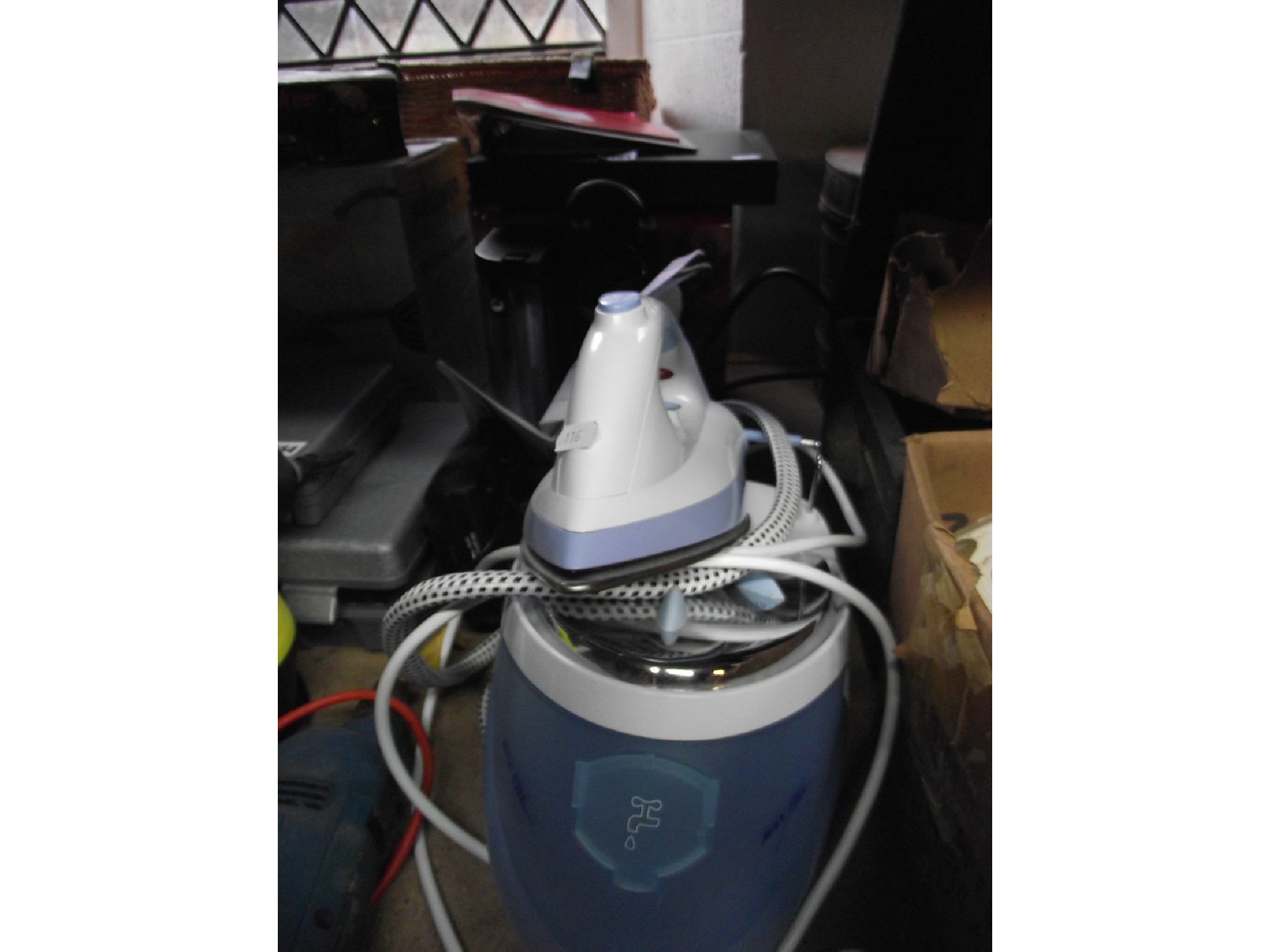 Appraisal: A Delonghi Nespresso coffee maker a Carlton steam generator iron