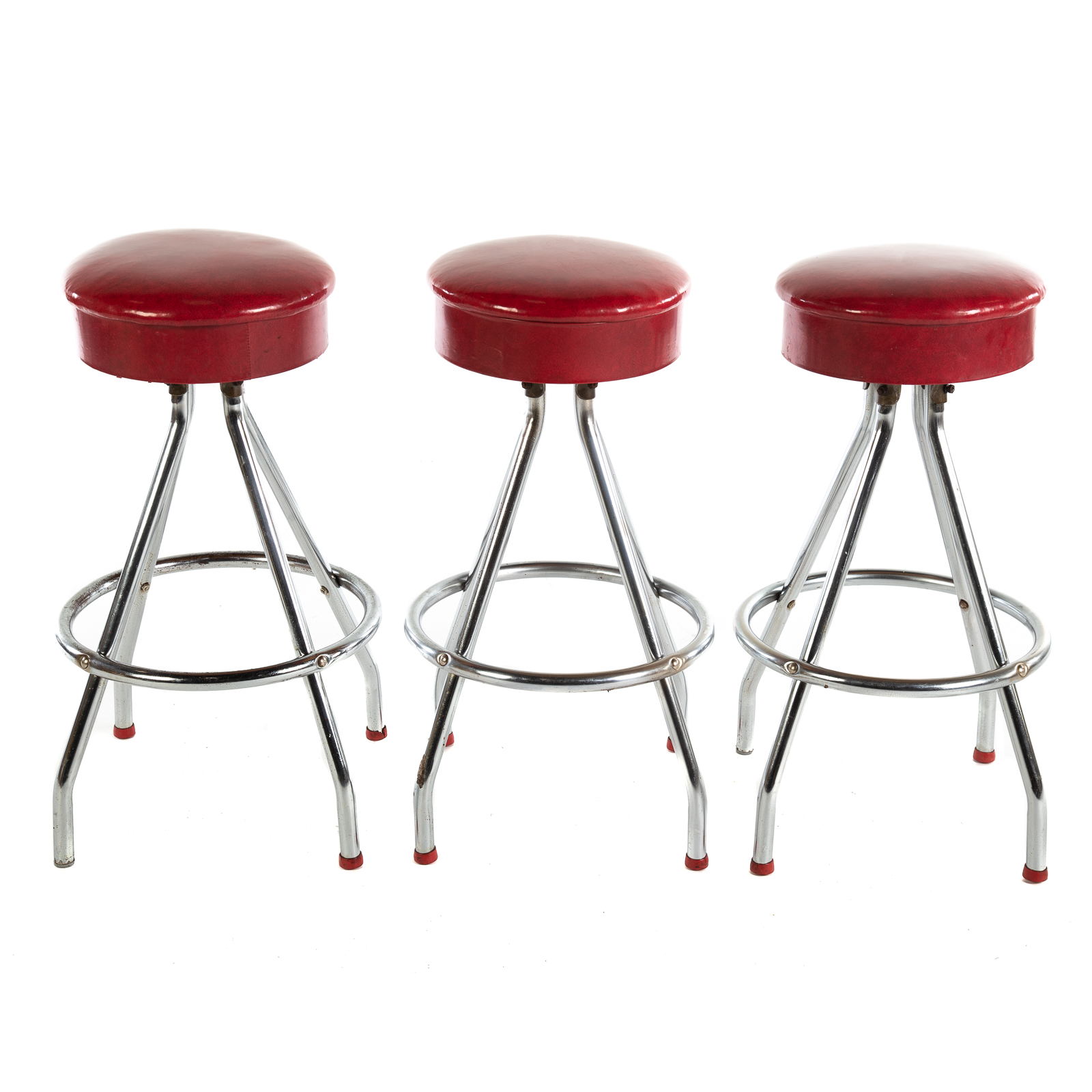 Appraisal: THREE VINTAGE RED VINYL COVERED BARSTOOLS in H Diam of