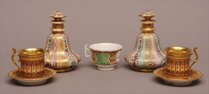 Appraisal: PARIS PORCELAIN GILT AND POLCHROME DECORATED PAIR OF TEA CUPS