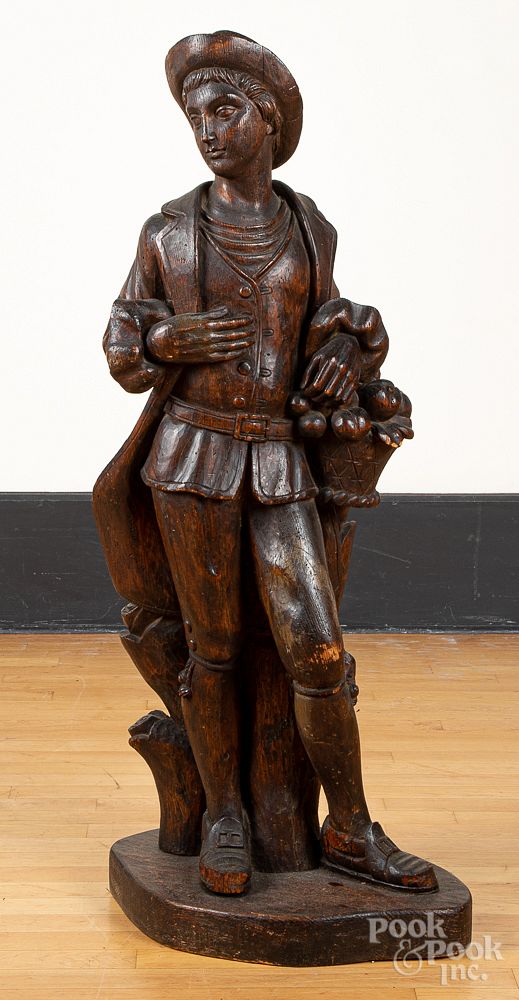 Appraisal: Carved pine figure of a young man th c Carved