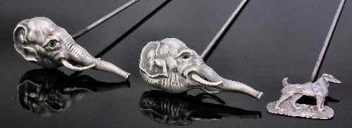 Appraisal: Two Edwardian silver elephant head pattern hat pins each ins