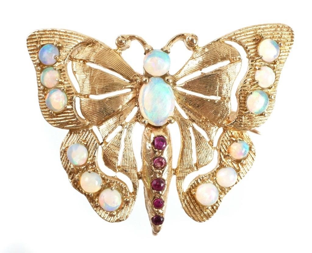 Appraisal: Detailed k yellow gold butterfly with prong set opals and