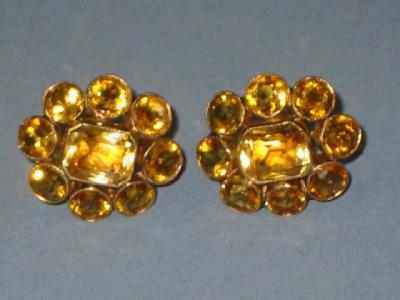 Appraisal: A PAIR OF CITRINE EARRINGS comprising central emerald cut stone