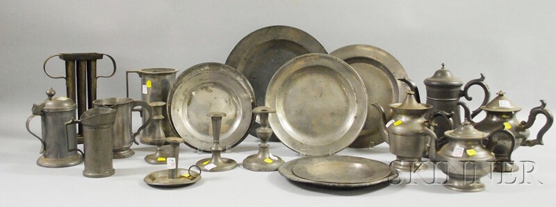 Appraisal: Twenty Pieces of Pewter Tableware including a chamberstick three measures