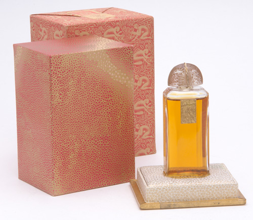 Appraisal: COTY L'Aimant perfume bottle in clear and frosted glass with