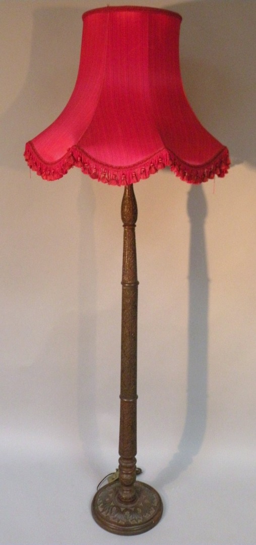 Appraisal: A thC hardwood lamp standard heavily decorated with flowers and