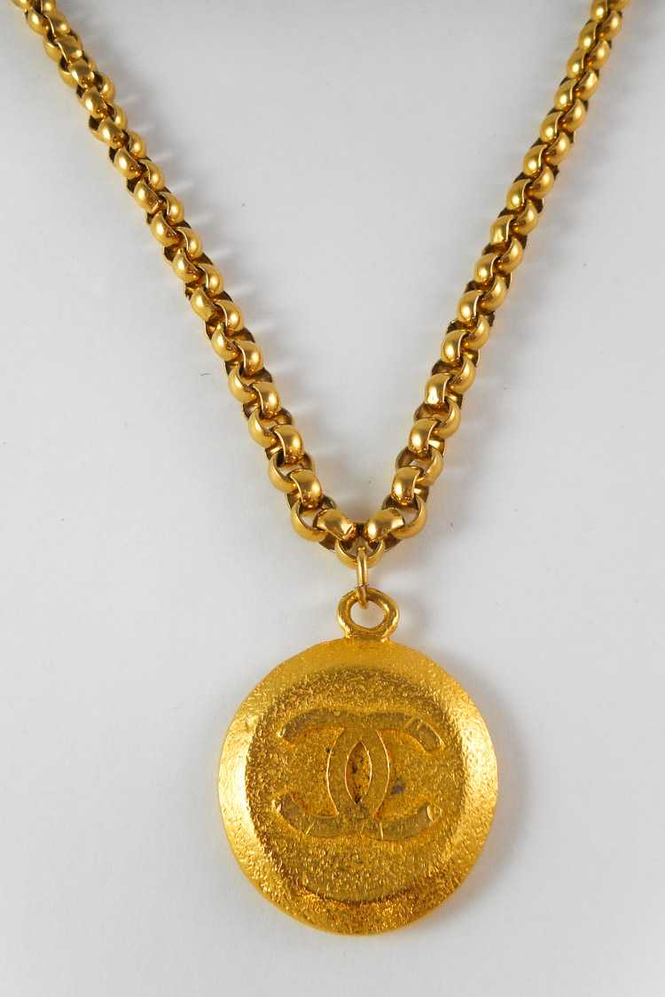 Appraisal: VINTAGE CHANEL GOLD-TONE MEDALLION NECKLACE with original Chanel box Suspended