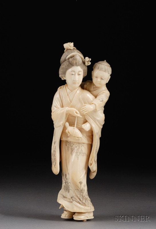 Appraisal: Ivory Carving Japan th century standing figure of a woman